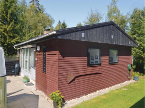 Two-Bedroom Holiday home Nibe with a Fireplace 06